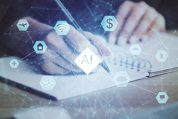 AI (Artificial Intelligence) concept. deep learning. Double exposure hands writing pad background.