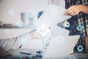 AI (Artificial Intelligence) concept. deep learning. Double exposure hands typing laptop.