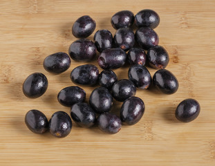 Black grapes on the table.