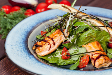  fresh and bright, fish salad from various and appetizing vegetables for designer solutions in cooking