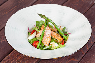  fresh and bright, fish salad from various and appetizing vegetables for designer solutions in cooking