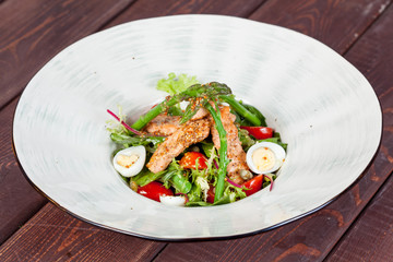  fresh and bright, fish salad from various and appetizing vegetables for designer solutions in cooking