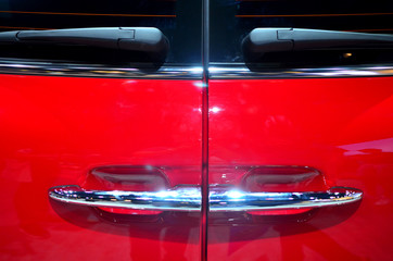 Rear door of red car