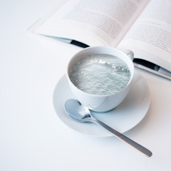 Ocean and  clouds in a coffee cup/dreaming concept