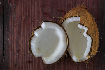 Half of coconut on wooden  background