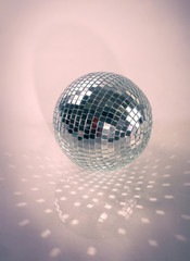 mirror ball.isolated on a dark background. photo with copy space