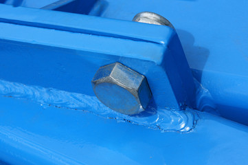 Joint with bolt and welding