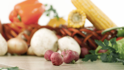 radishes on a background of fresh vegetables
