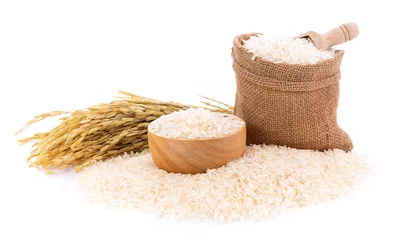 Fototapeten Pile of white rice on white background © nortongo