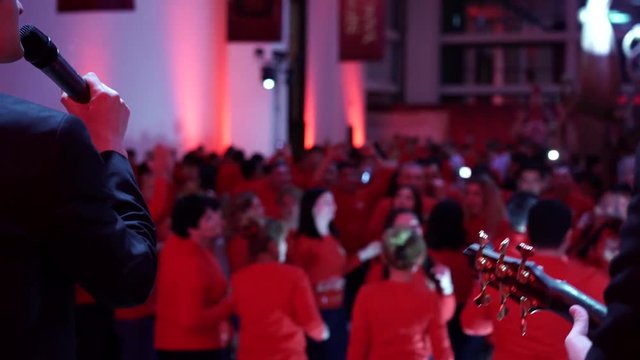 the singer sings to the audience