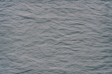 Texture of gray crumpled fabric for background