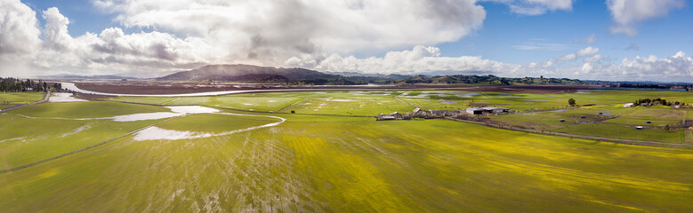 Aerial panorama of farms and mountains in Sonoma County, California.