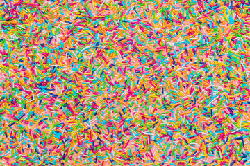 trendy pattern of colorful sprinkles like background, sweet decoration