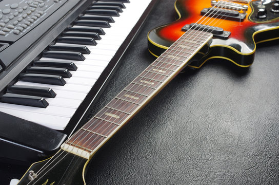 Electric guitar and piano keyboard.