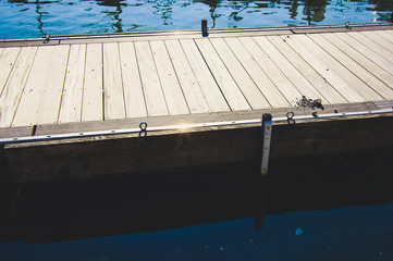 Boat dock on Lake Constance with a view of the Alps