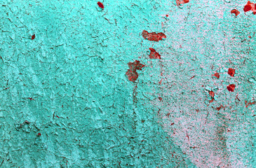 Old wooden background with remains of pieces of scraps of old paint on wood. Texture of an old tree, board with paint, vintage background peeling paint. old blue board with cracked paint, vintage