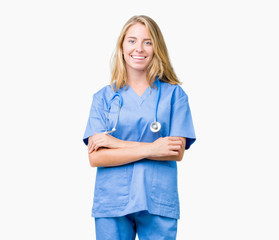 Beautiful young doctor woman wearing medical uniform over isolated background happy face smiling...
