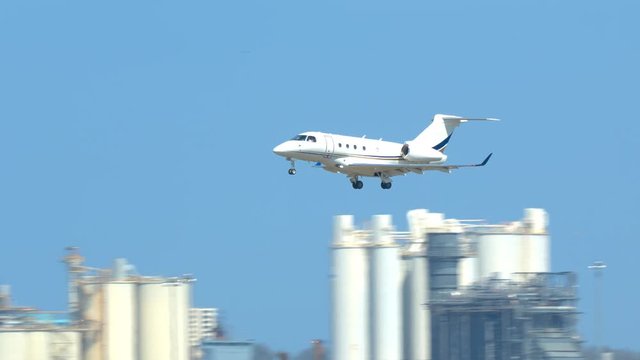 Generic Unmarked VIP Business Jet Private Airplane Landing on a Commercial Airport Runway