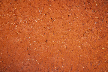 Texture of a traditional African facade made of straw and mud in Morocco