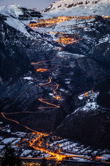 Night view of the famous road climb to Alpe d'Huez, right at the main traffic time in February, when all the tourists are coming to enjoy the ski resort.