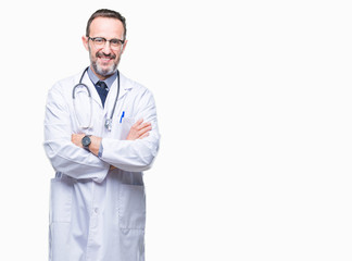 Middle age senior hoary doctor man wearing medical uniform isolated background happy face smiling with crossed arms looking at the camera. Positive person.
