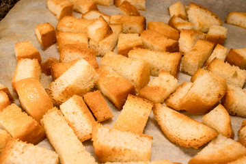 Fresh fried (baked) crunchy crispy golden croutons (traditional snack like cracker) from white bread