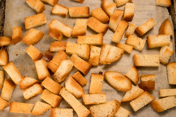 Fresh fried (baked) crunchy crispy golden croutons (traditional snack like cracker) from white bread