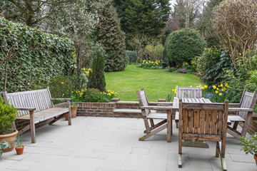 Patio with wooden garden furniture