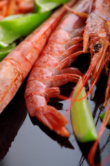 Closeup .Shrimps.Raw fresh big shrimps with lime .
