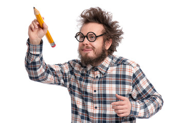 Crazy bearded Man in plaid shirt with funny Haircut in eye Glasses holding Big Pencil and writing...