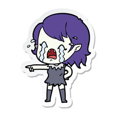 sticker of a cartoon crying vampire girl