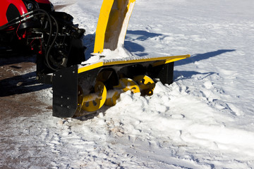 snow combine harvests dirty snow on the road. Gatchina, Russia. snow removal, reportage shooting.