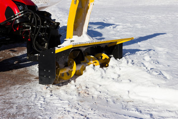 snow combine harvests dirty snow on the road. Gatchina, Russia. snow removal, reportage shooting.
