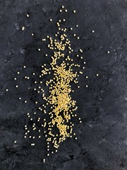 millet on dark background