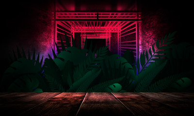 Dark empty room, wooden table, brick walls. Tropical leaves, neon light. Night view.