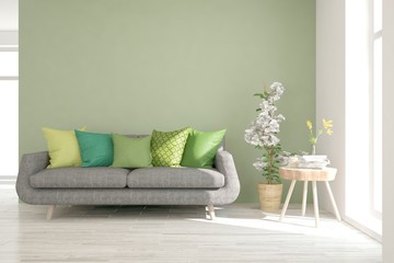 Green stylish minimalist room with sofa. Scandinavian interior design. 3D illustration