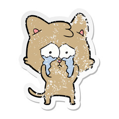 distressed sticker of a cartoon crying cat