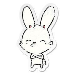 distressed sticker of a curious bunny cartoon