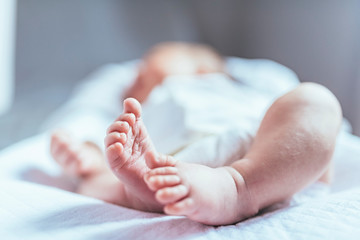 Obraz na płótnie Canvas Adorable newborn female baby