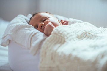 Adorable newborn female baby
