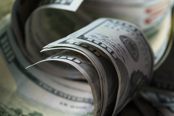 American dollars. A stack of hundred dollar bills. Close up