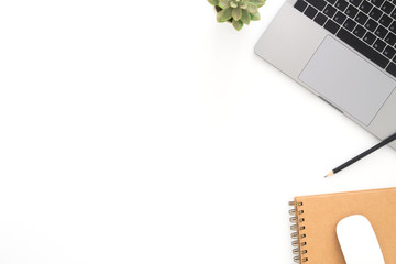 Creative flat lay photo of workspace desk. Top view office desk with laptop, pencil, notebook and...