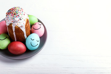 Easter colored eggs and Easter bread. Festive preparation for a card.
