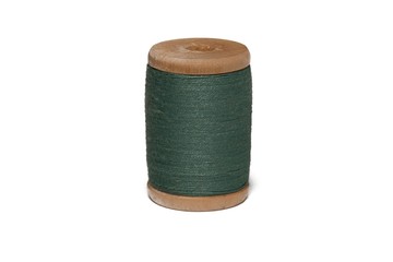 Wooden coil with thread on a white isolated background