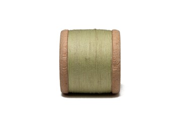 Wooden coil with thread on a white isolated background