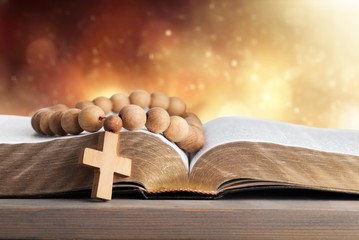 Open Holy bible book on background