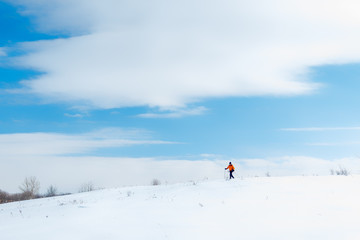 Fototapeta na wymiar Breaking trail in wonderful fresh snow