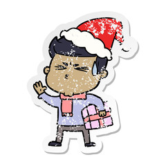 distressed sticker cartoon of a man sweating wearing santa hat