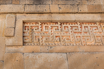 Elaborate fretwork found in old ruins in Oaxaca, Mexico. Intricate stone detail found in the archaeological site of Mitla