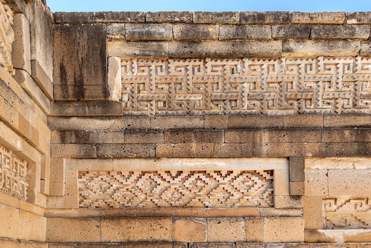 Elaborate fretwork found in old ruins in Oaxaca, Mexico. Intricate stone detail found in the archaeological site of Mitla